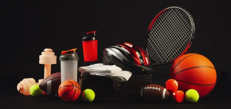 Set of sport equipment on dark background