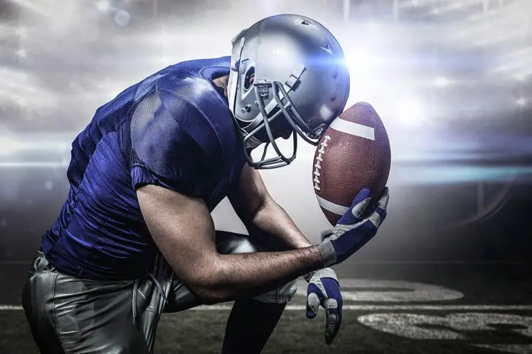 Composite image of upset american football player with ball